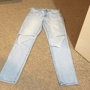 Light blue ripped jeans
